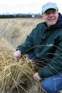 Chris Miller with beach grass at the Plant Materials Center