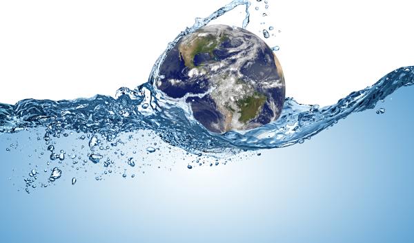 planet earth globe in wave of water in the ocean